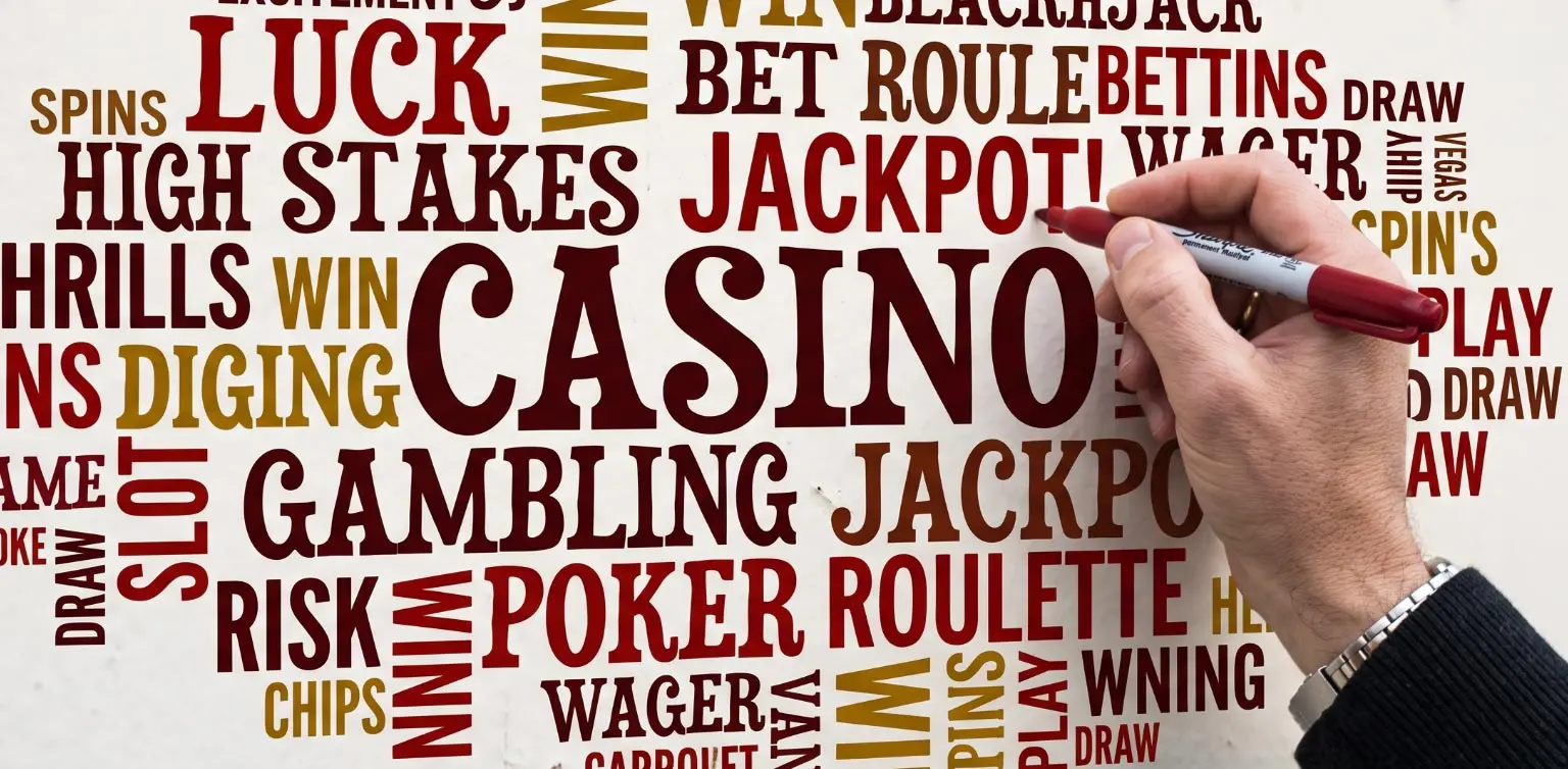 Collage of online casino terms in red text facing all directions